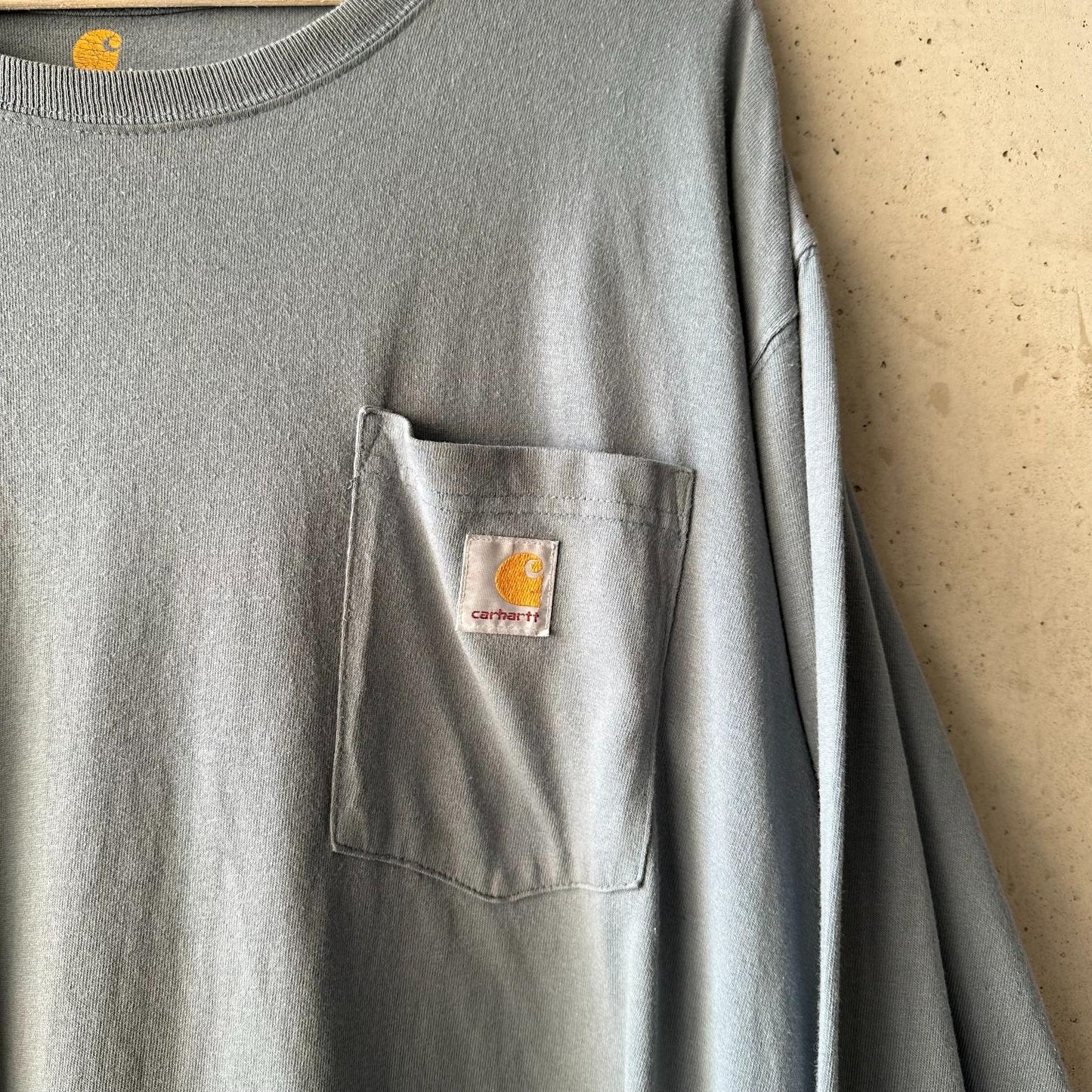 (XL) Reme Carhartt Pocket Manga Larga "Sky Blue"