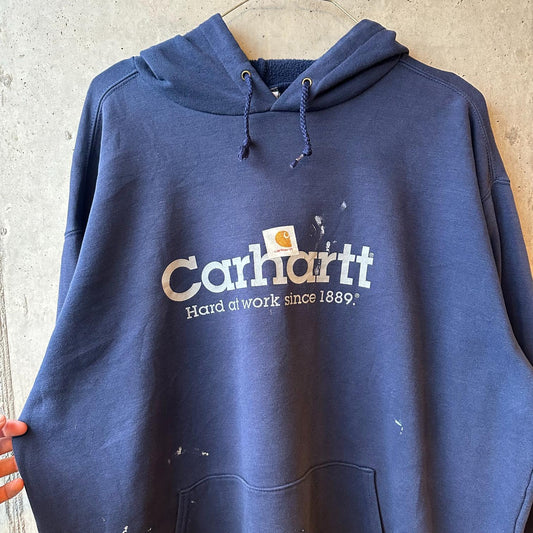 Canguro Vintage Carhartt Azul con Pintura "Imagotipo x Hard at Work since 1889"