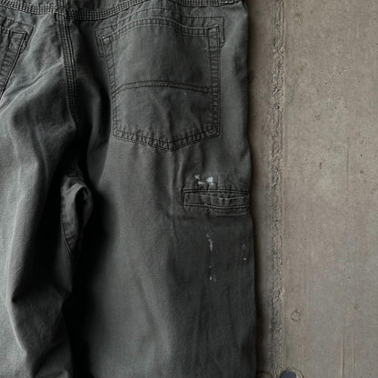 Pantalón Carpintero Wrangler "Moss Green x Paint"